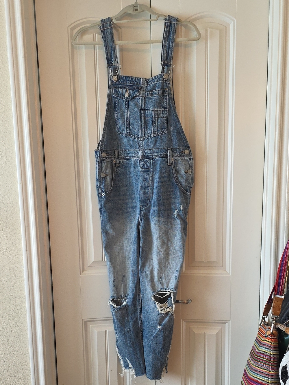We The Free light blue denim jeans with cream label